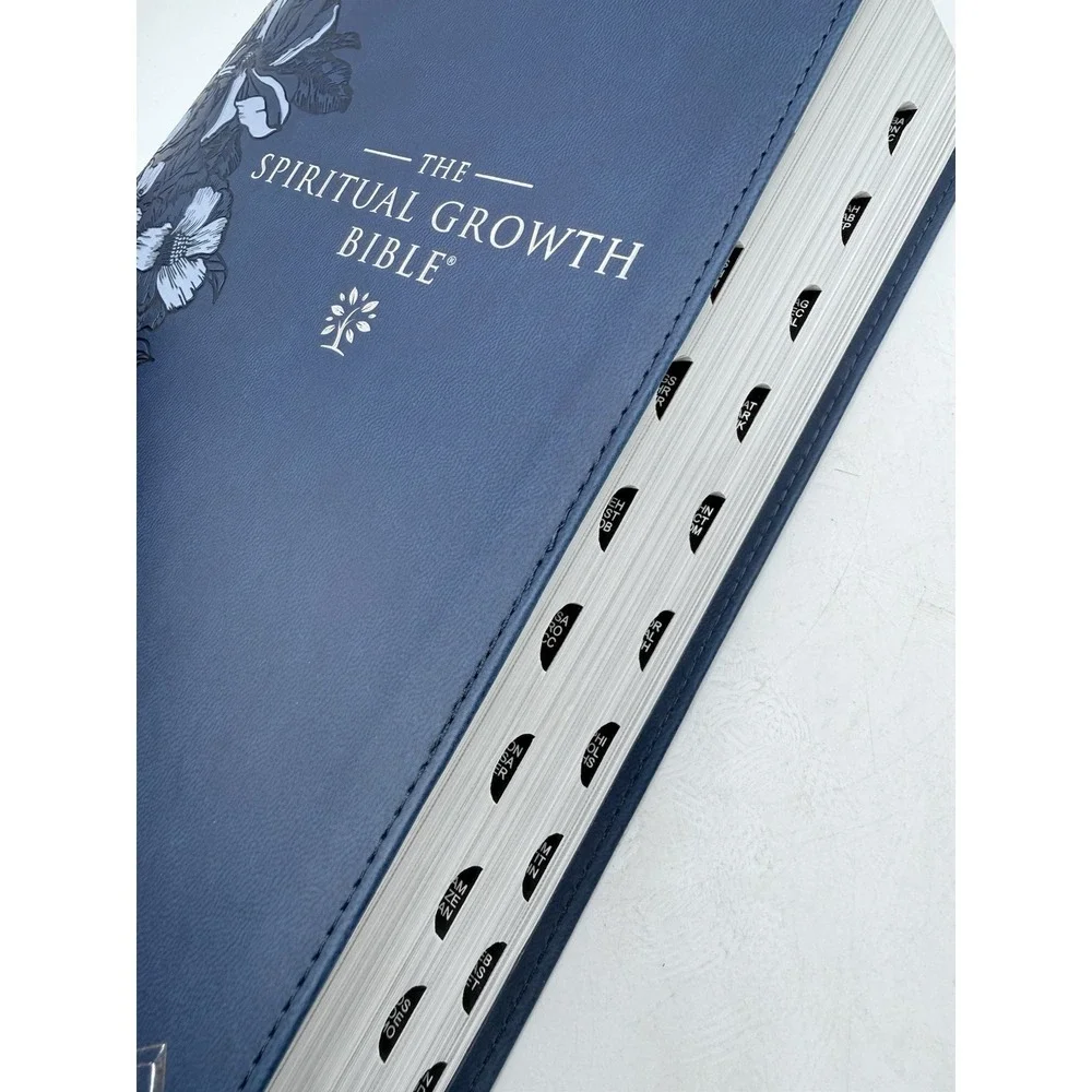 The Spiritual Growth Bible NLT: navy blue faux leather with thumb index
